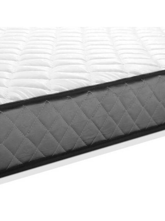 Side profile view of the Olsen single mattress along with the top layer